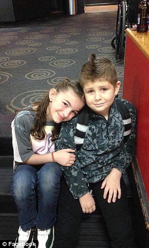 2E959DFA00000578-3324777-Eight_year_old_David_who_has_leukemia_has_found_love_with_his_se-m-50_1447902786418