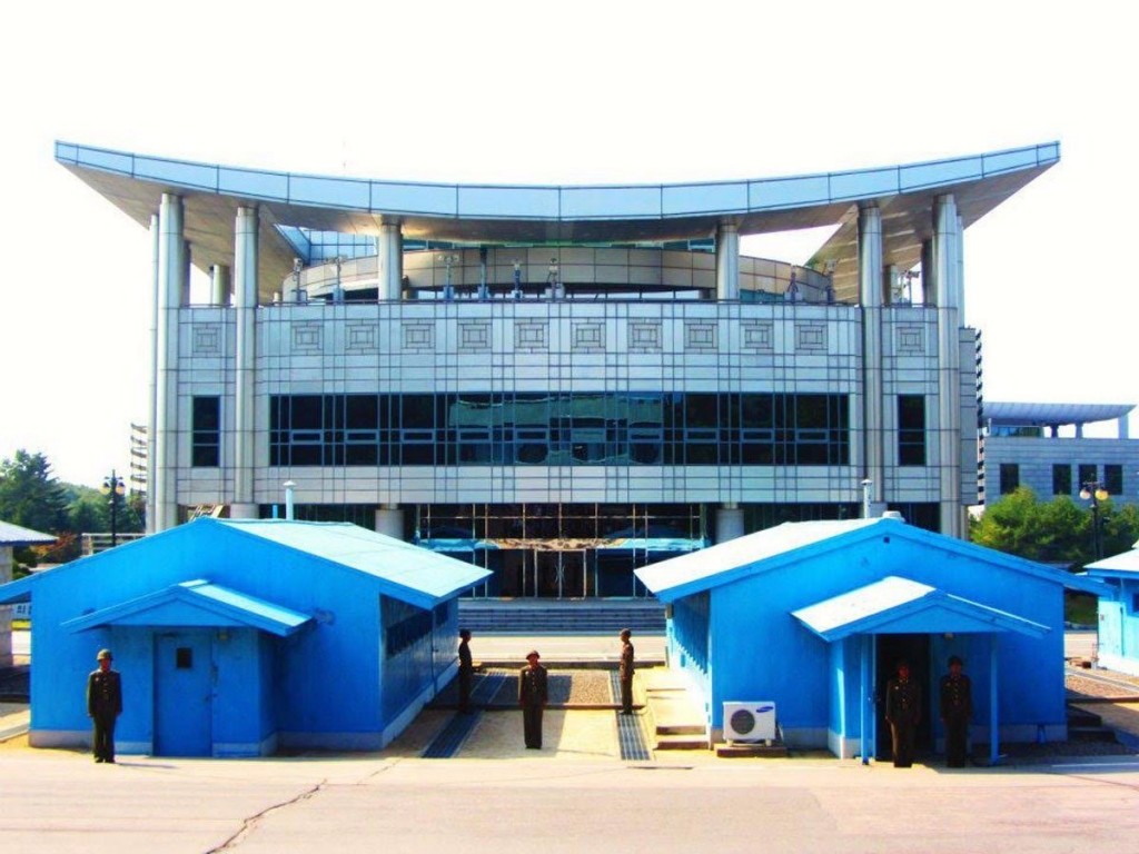 the-border-between-south-korea-and-north-korea-starts-at-the-concrete-line-between-the-blue-huts-pictured-here-former-us-president-bill-clinton-once-called-the-area-which-is-the-most-heavily-militarized-border-in-