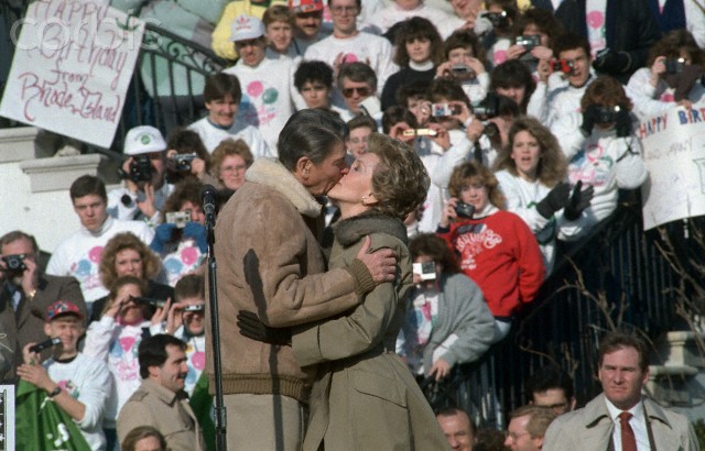 Ronald Reagan and Wife Nancy Kissing