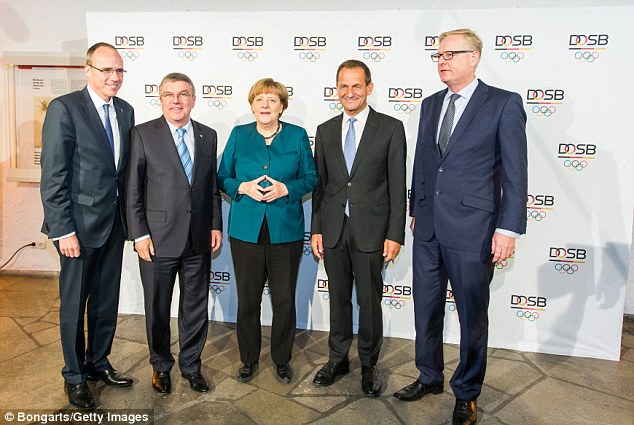 36898DD000000578-3704890-FRANKFURT_AM_MAIN_GERMANY_MAY_20_L_R_Peter_Beuth_Interior_Minist-a-13_1469293289529