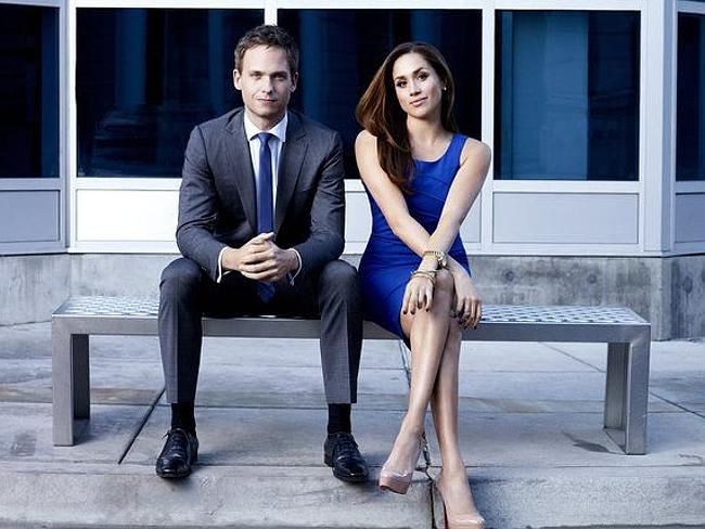 SUITS -- Season: 2 -- Pictured: (l-r) Patrick J. Adams as Mike Ross, Meghan Markle as Rachel Zane -- Photo by: Robert Ascroft/USA Network