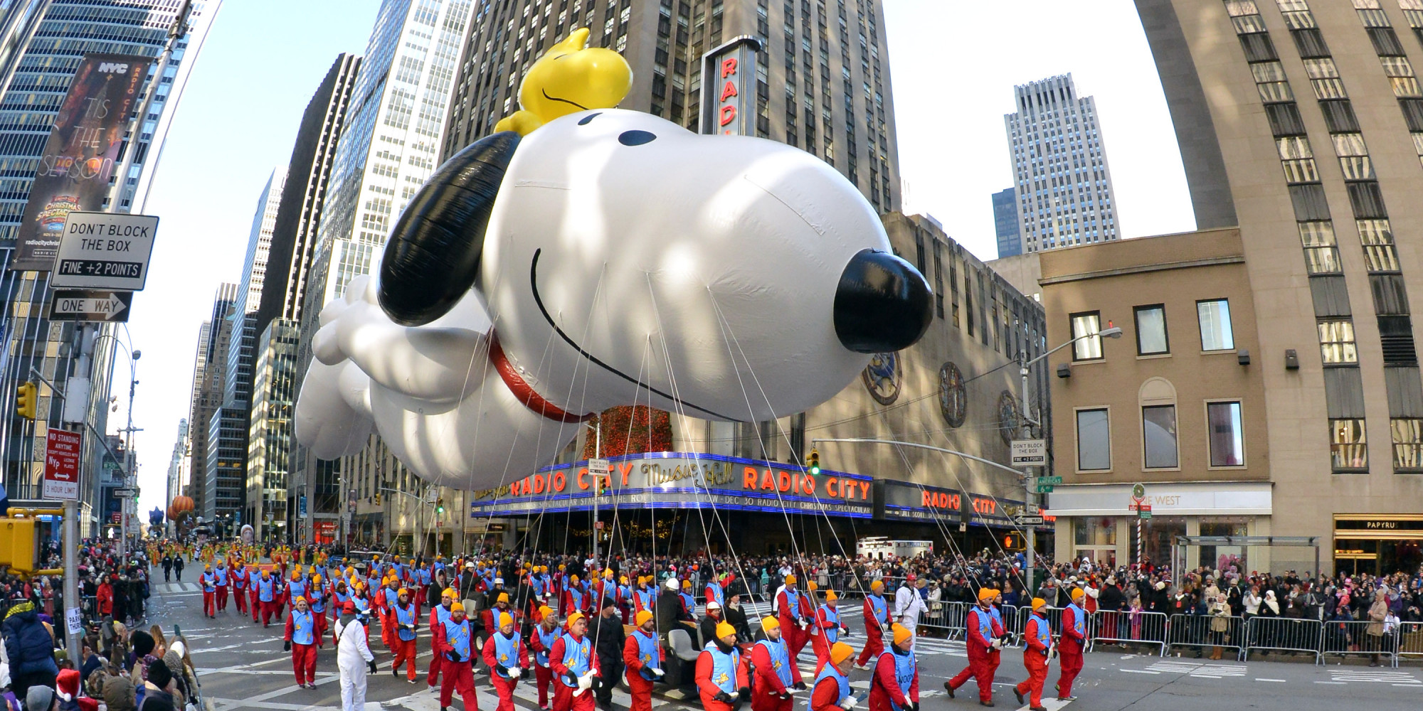NEW YORK, NY - NOVEMBER 28: (EDITOR'S NOTE: Image was shot with a fisheye lens) Snoopy makes his way down Avenue of the Americas during the 87th Macy's Thanksgiving Day Parade on November 28, 2013 in New York City. (Photo by Neilson Barnard/Getty Images)