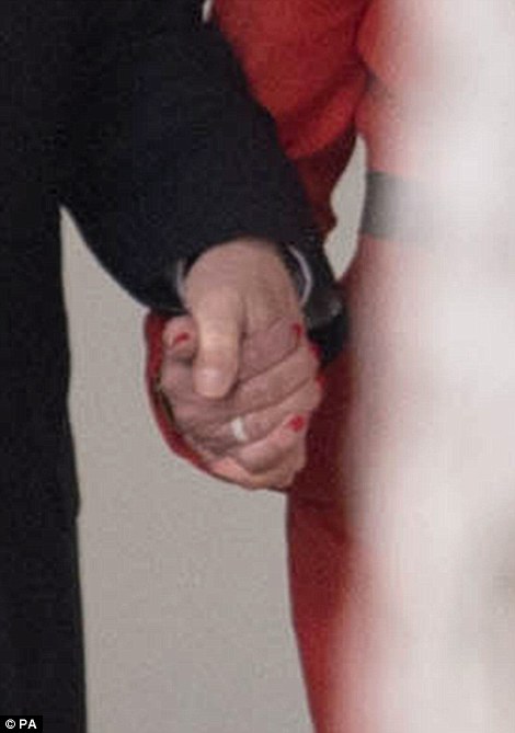 3C92C32800000578-4164078-Mr_Trump_and_Mrs_May_were_spotted_holding_hands_as_they_walked_a-a-10_1485545037939