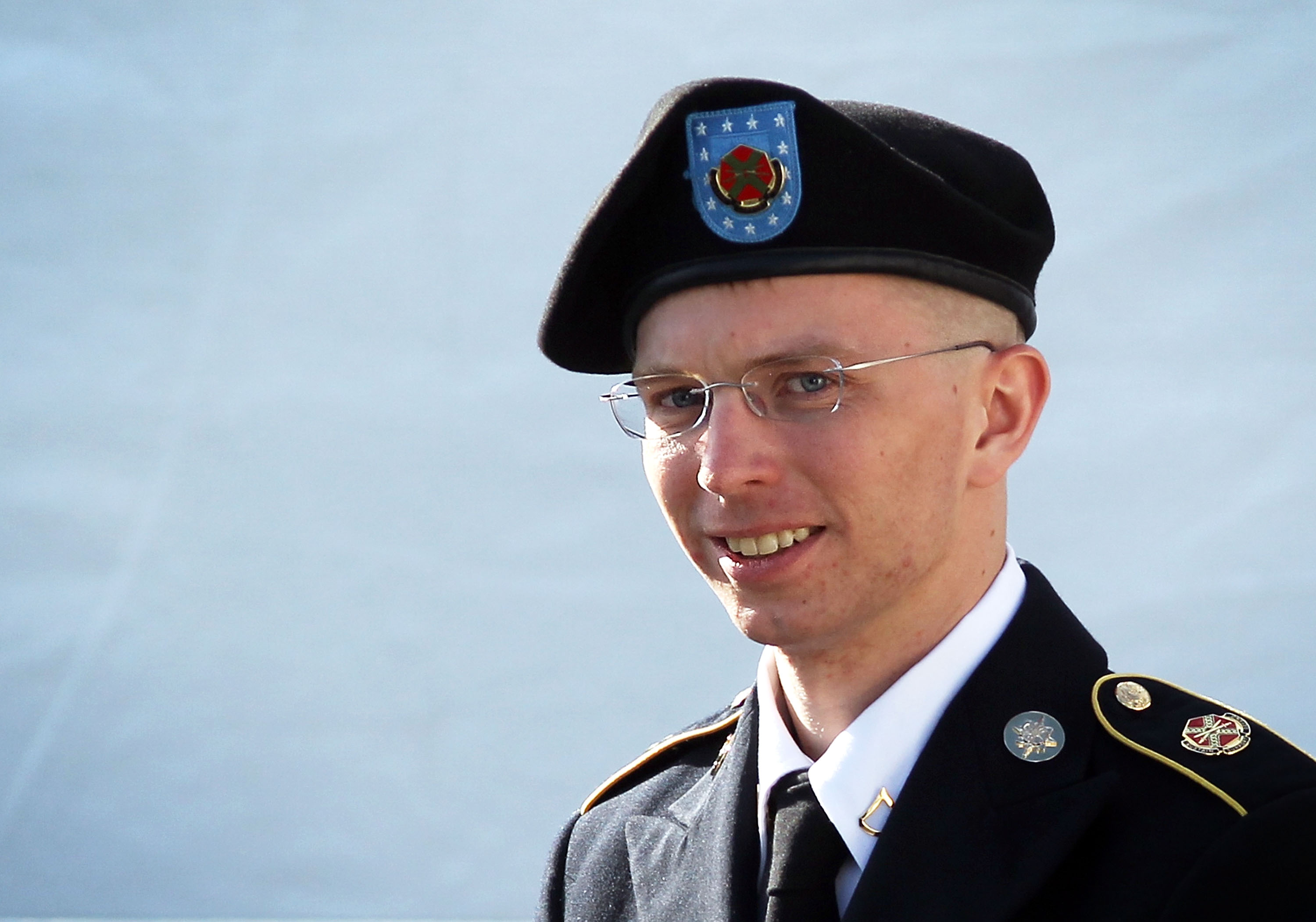 FORT MEADE, MD - JUNE 06: U.S. Army Private Bradley Manning is escorted as he leaves a military court at the end of the first of a three-day motion hearing June 6, 2012 in Fort Meade, Maryland. Manning, an Army intelligence analyst who has been accused of passing thousands of diplomatic cables and intelligence reports to the whistleblowing website WikiLeaks and facing 22 charges including aiding the enemy, returned to the court room to ask for dismissal of 10 of the charges. (Photo by Alex Wong/Getty Images)