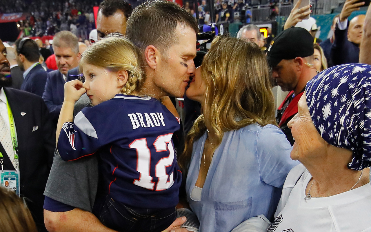 HOUSTON, TX - FEBRUARY 05: Tom Brady #12 of the New England Patriots celebrates with wife Gisele Bundchen and daughter Vivian Brady after defeating the Atlanta Falcons during Super Bowl 51 at NRG Stadium on February 5, 2017 in Houston, Texas. The Patriots defeated the Falcons 34-28. (Photo by Kevin C. Cox/Getty Images)