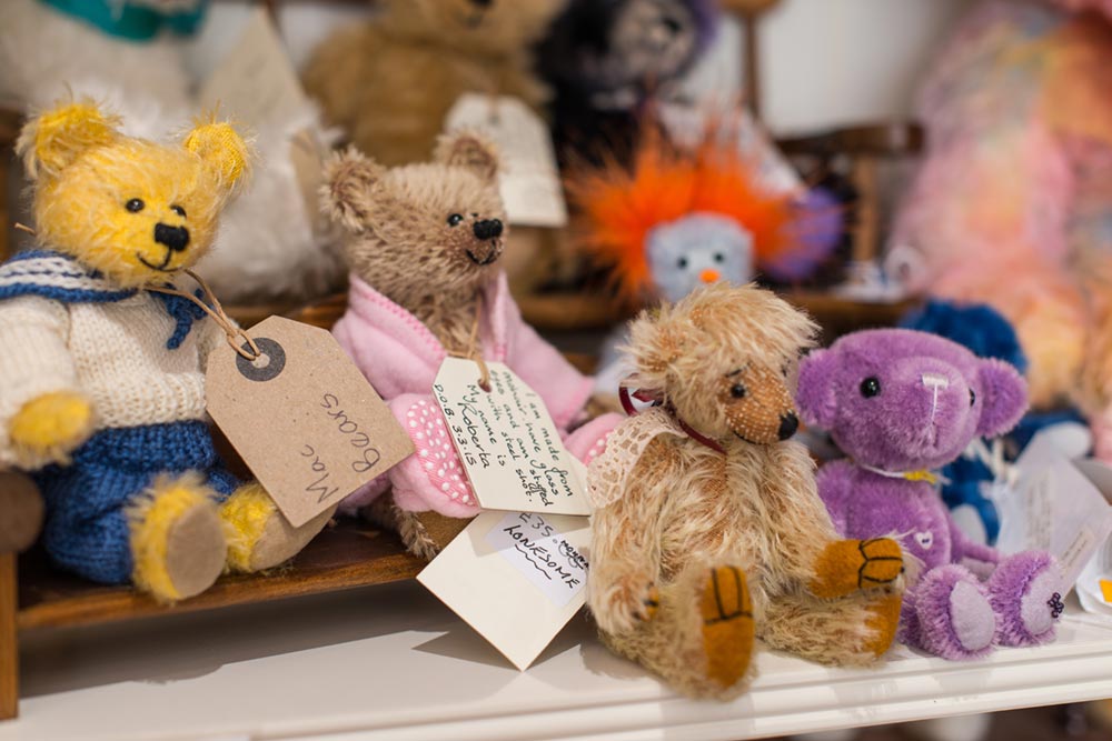 Teddy-Bears-sitting-together-Alices-Bear-Shop-Lyme-Regis
