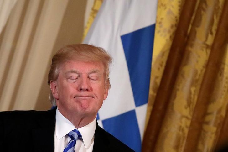 U.S. President Donald Trump reacts at the East room of the White House in Washington, U.S. March 24, 2017. REUTERS/Carlos Barria