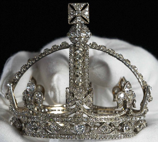 **NO ONLINE USE UNTIL 10.30AM, MARCH 28, 2012** Queen Victorias small diamond crown is prepared for display in a new exhibition of the Crown Jewels opening tomorrow (29 March) at the Tower of London to celebrate The Queens Diamond Jubilee. The Royal Collection (c) Her Majesty Queen Elizabeth II. HRP/NTI Terms and conditions of use: this photograph is issued to end-user media only. Single use only in connection with the re-presentation of the Crown Jewels at the Tower of London. Photographs must not be archived or sold on