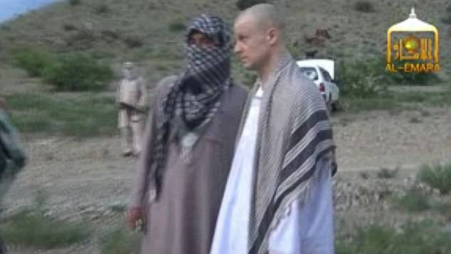 4564472700000578-4984786-Bergdahl_is_seen_above_being_released_in_2014_after_five_years_o-a-3_1508167727135