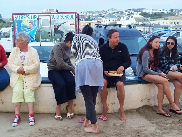 Polzeath Beach Cornwall Tuesday Evening around 8.00pm 23/08/16 Ex PM David Cameron and wife Samantha enjoy a fish supper after a day on the beach in Cornwall - Picture taken by a friend no by-line taken on i-phone