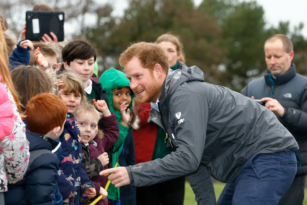 Prince Harry meets children from Weeton Primary School and Honeypots Nursery during a visit to Weeton Barracks near Blackpool. PRESS ASSOCIATION Photo. Picture date: Friday February 5, 2016. Harry also met some of the soldiers from the 2nd Battalion, The Duke of Lancaster's Regiment, who were deployed to Lancashire, Yorkshire and Cumbria to find out how they aided recovery work in the recent floods. See PA story ROYAL Harry. Photo credit should read: Owen Humphreys/PA Wire