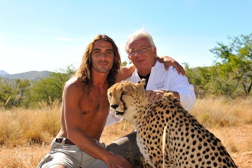 Alain and Olivier Houalet with a tame cheetah Namibia