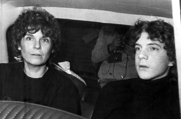 FILE - In this Dec. 15, 1973 file photo, former actress Gail Harris arrives in a police car with her son John Paul Getty III at police headquarters in Rome. Getty, the troubled grandson of a U.S. multibillionaire oil magnate who once lost an ear in a grisly kidnapping, has died at age 54. His son, actor Balthazar Getty, confirmed Tuesday Feb. 8, 2011 that his father died Saturday Feb. 5, 2011 surrounded by his family at his English mansion in Buckinghamshire, northwest of London. The cause of death was not disclosed. (AP Photo/Giuseppe Anastasi, File)