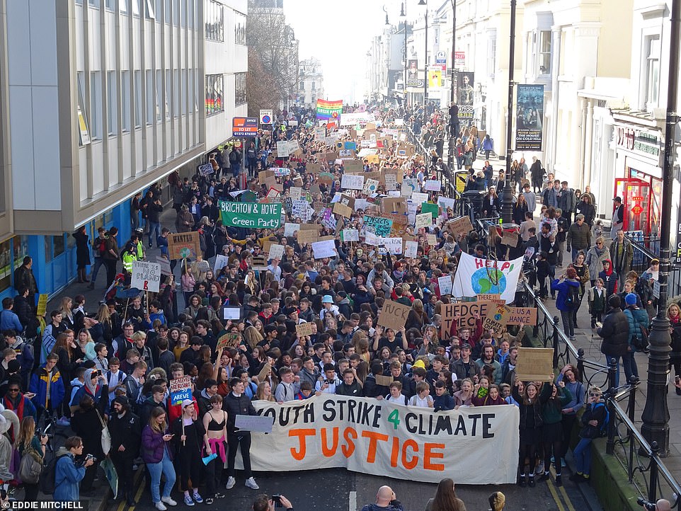 9859212-6707907-Students_walk_through_Brighton_as_they_carry_out_a_Youth_Strike_-a-222_1550243343759