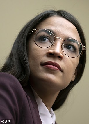 17130270-7344297-Alexandria_Ocasio_Cortez_is_leading_the_charge_to_demand_a_thoro-m-3_1565473084126