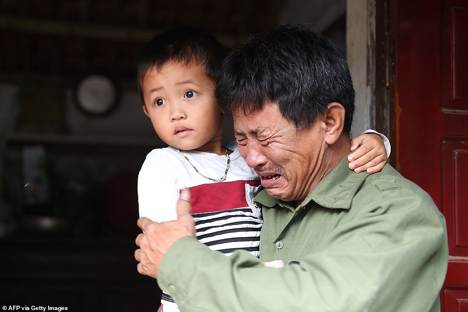 20238254-7618377-Le_Minh_Tuan_pictured_has_not_heard_from_his_son_Le_Van_Ha_since-a-48_1572168587162