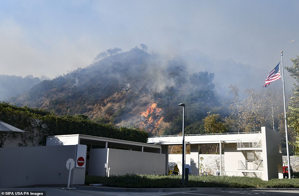 20307878-7624199-A_small_fire_erupts_at_the_entrance_of_The_Getty_Center_in_Los_A-a-107_1572317579960