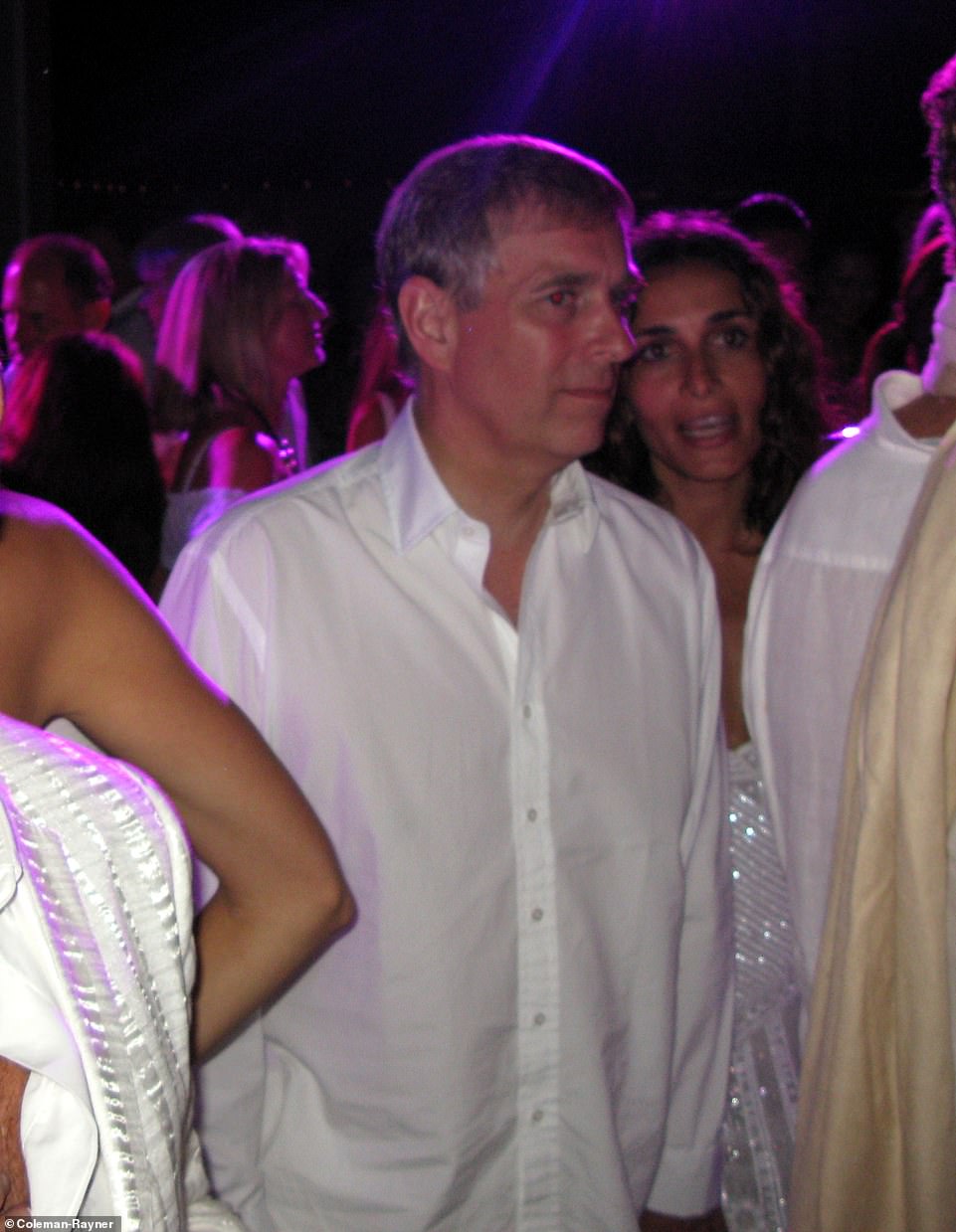 21125954-7695233-Prince_Andrew_is_seen_dancing_with_a_woman_identified_as_Libyan_-a-13_1574027123270