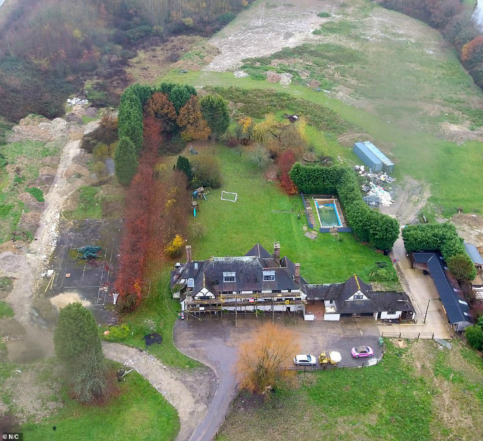 21494854-7726455-The_huge_2million_property_in_West_Sussex_has_been_billed_a_muck-a-4_1574815887318