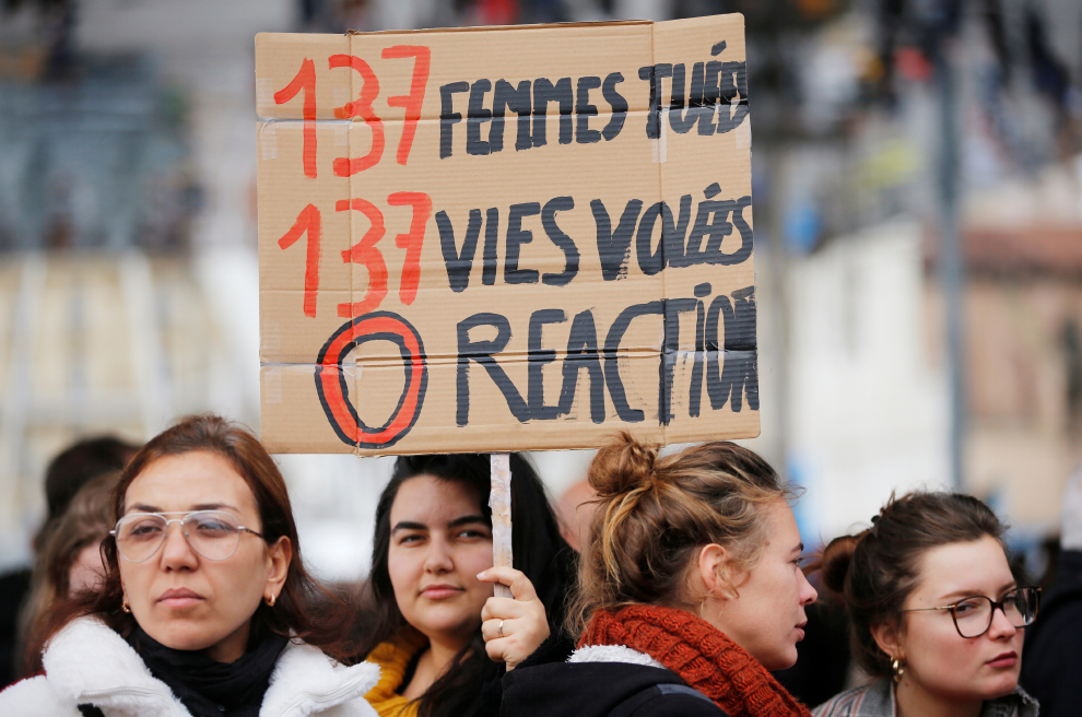 People attend a demonstration against femicide and violence against women in Marseill