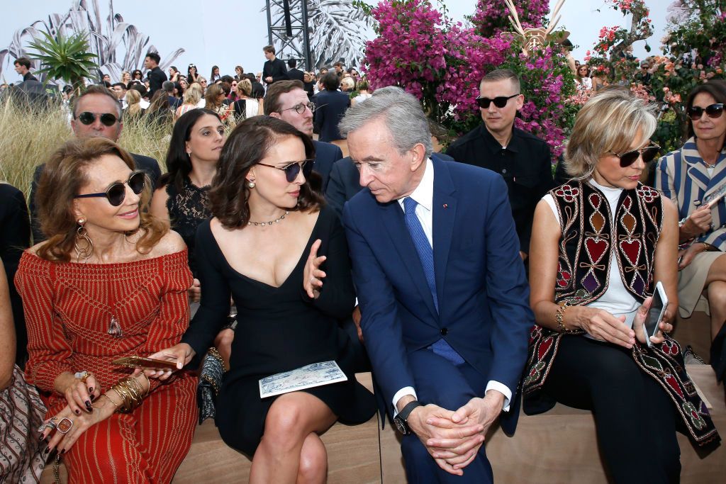 PARIS, FRANCE - JULY 03: (L-R) Marisa Berenson, Natalie Portman Owner of LVMH Luxury Group Bernard Arnault and his wife Helene Arnault attend the Christian Dior Haute Couture Fall/Winter 2017-2018 show as part of Haute Couture Paris Fashion Week on July 3, 2017 in Paris, France. (Photo by Bertrand Rindoff Petroff/Getty Images)