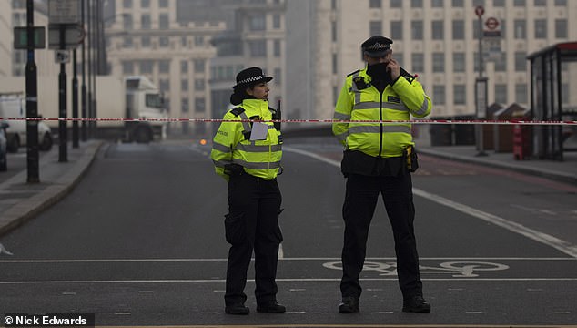 21645476-7742383-Police_officers_are_still_on_London_Bridge_as_Scotland_Yard_reve-a-71_1575152768990
