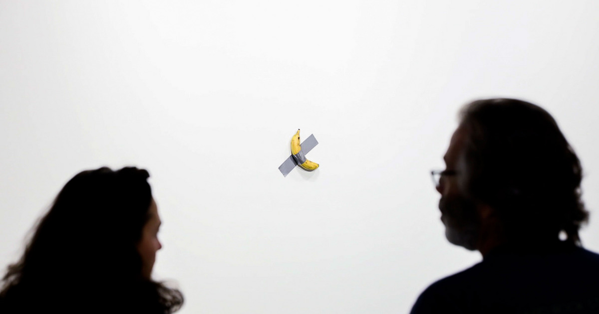 maurizio-cattelan-duct-tapes-banana-to-wall-makes-240000-credits-new-york