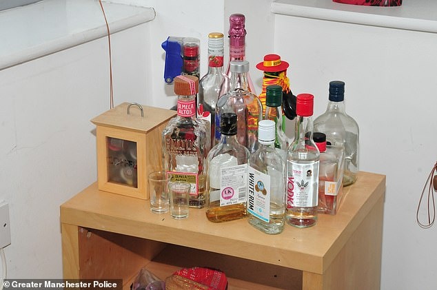 23054934-7858059-Spirit_bottles_at_Sinaga_s_flat_are_pictured_He_is_thought_to_ha-a-33_1578368609670.jpg