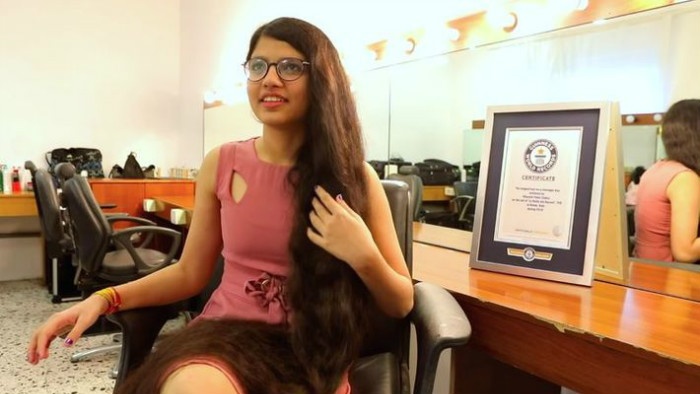 guinness-world-record-long-hair-teenager-png_710x400xt.jpg