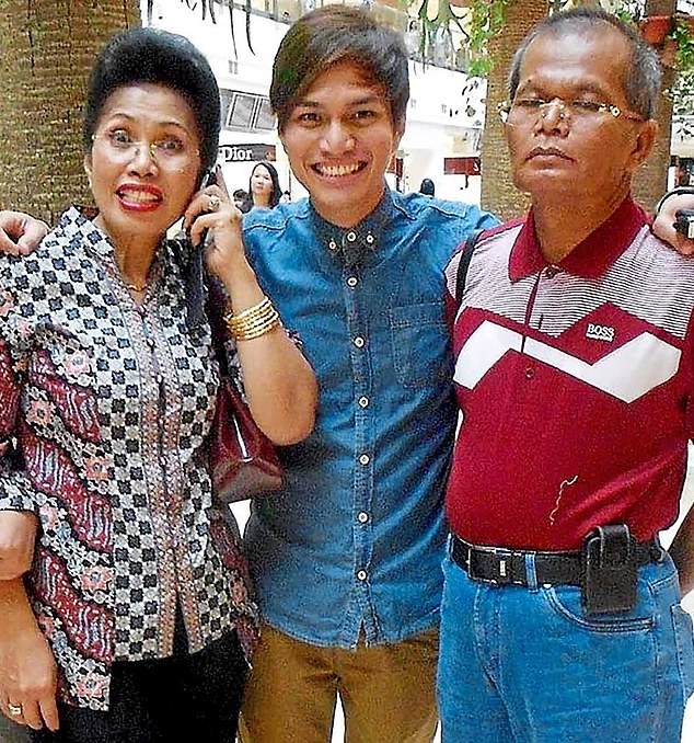 23074360-7858059-Privileged_Sinaga_centre_with_his_property_tycoon_father_Saibun_-a-28_1578368608955.jpg