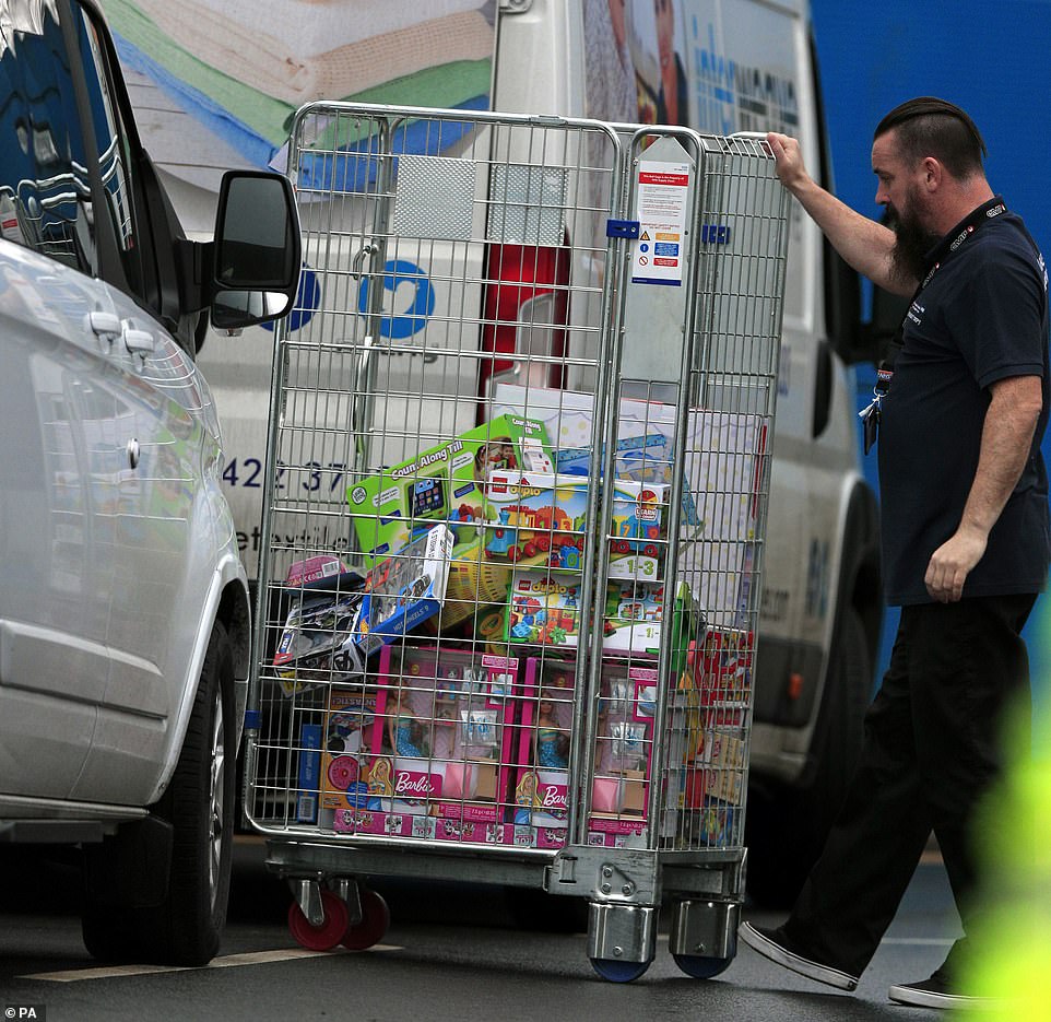 24130432-7952359-Barbie_dolls_are_among_the_toys_being_brought_into_the_housing_a-a-26_1580496413696