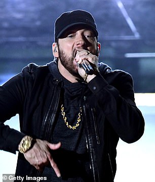 24529412-7985629-Surprise_performance_Eminem_took_to_the_Oscar_stage_on_Sunday_ni-a-62_1581309306854