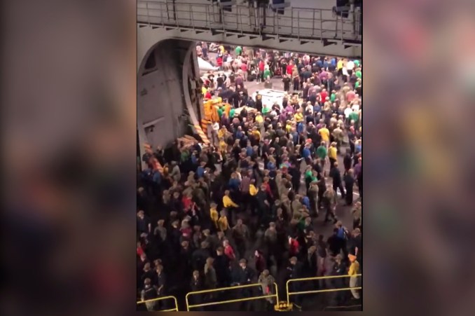 Screen grabs of Sailors onboard the USS Theodore Roosevelt gave a raucous farewell to their captain on April 3, hours after he was removed from command after raising the alarm about coronavirus (COVID-19) cases on the vessel. Taken from facebook. Captain Crozier https://www.facebook.com/taliah.peterkin?__tn__=%2CdC-R-R&eid=ARA_7x6KkS7pyGUyTG_doZ-Su8meQS2SwgDk8cwytVCAJz251sC6FY3d_UoTbOzZJ-uQqujJZKujv92j&hc_ref=ARQdVB1zFAcxHjGA9q1hMrStPatcnTdT5QRdTtXcXOus1mAofEfWh-HJ_R44kTicwUk&fref=nf