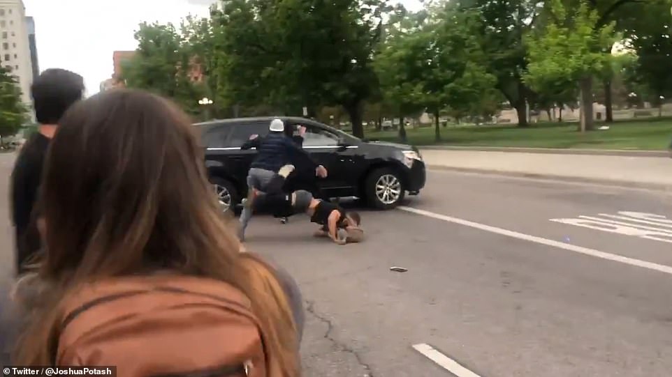 28956488-8367883-Denver_Colorado_The_car_veers_toward_him_before_speeding_up_and_-a-47_1590741051815