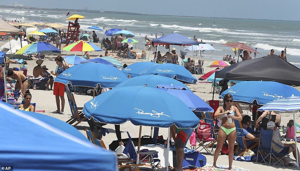 28782590-8353095-Cocoa_Beach_Florida_was_packed_with_Memorial_Day_beachgoers_on_S-a-5_1590390419086.jpg