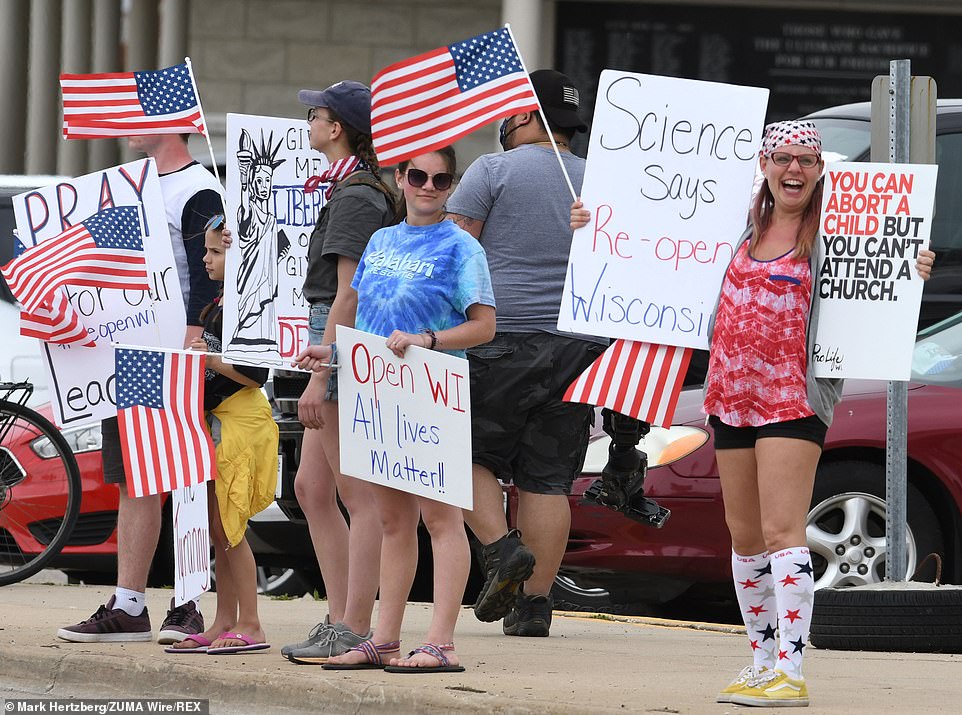 28367180-8317653-Lockdown_protesters_in_Wisconsin_are_seen_earlier_this_month_Eve-a-26_1589435251265.jpg