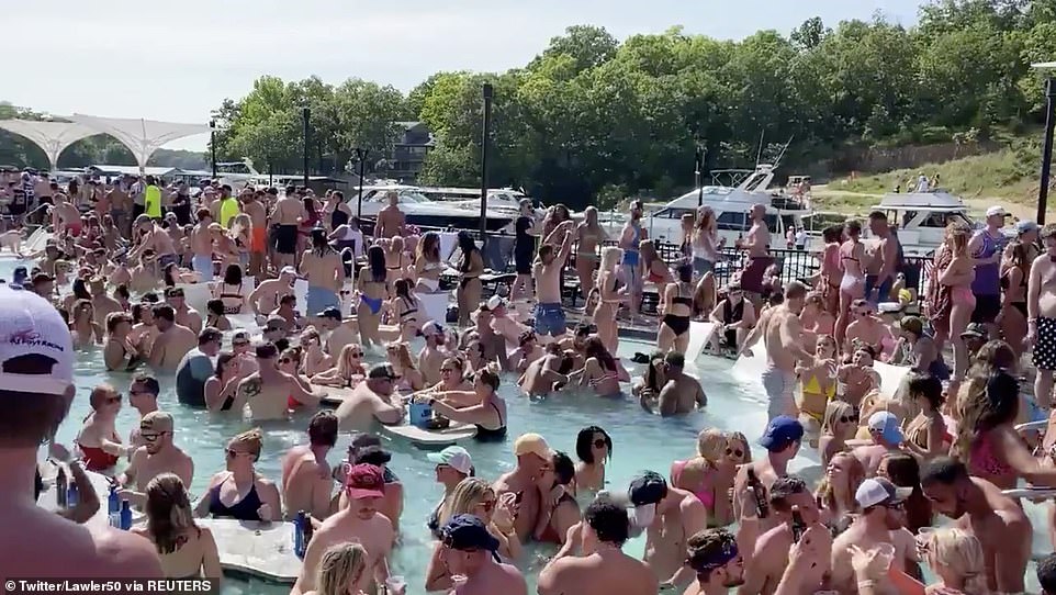 28776978-8353095-Revelers_are_seen_celebrating_Memorial_Day_weekend_at_Osage_Beac-a-7_1590390419371.jpg