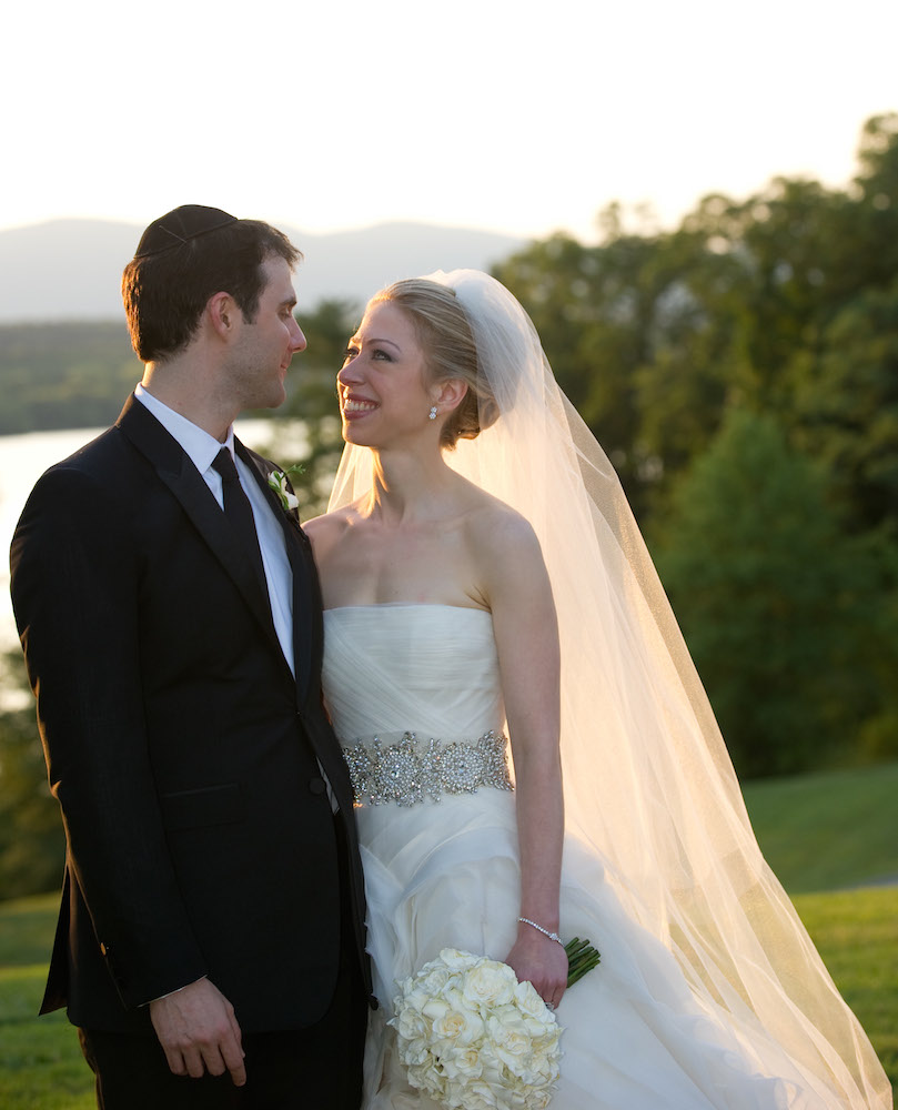 RHINEBECK, NY - JULY 31: In this handout image provided by Barbara Kinney, Marc Mezvinsky (L) and Chelsea Clinton pose during their wedding at the Astor Courts Estate on July 31, 2010 in Rhinebeck, New York. Chelsea Clinton, the daughter of former U.S. President Bill Clinton and Secretary of State Hillary Clinton, married Marc Mezvinsky today in an interfaith ceremony at the estate built by John Jacob Astor on the Hudson River about two hours north of New York City. (Photo by Barbara Kinney via Getty Images) *** Local Caption *** Chelsea Clinton;Marc Mezvinsky