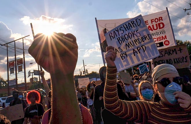 13ca19b8-ed9f-4aa9-9c58-d04fdda8e88b-AP_Protest_Shooting_Atlanta.1